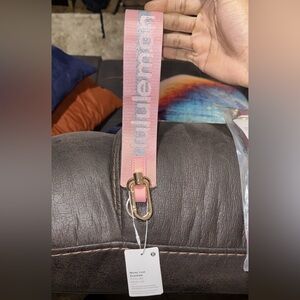 Lululemon Pink and Red Keychains with Silver Logo